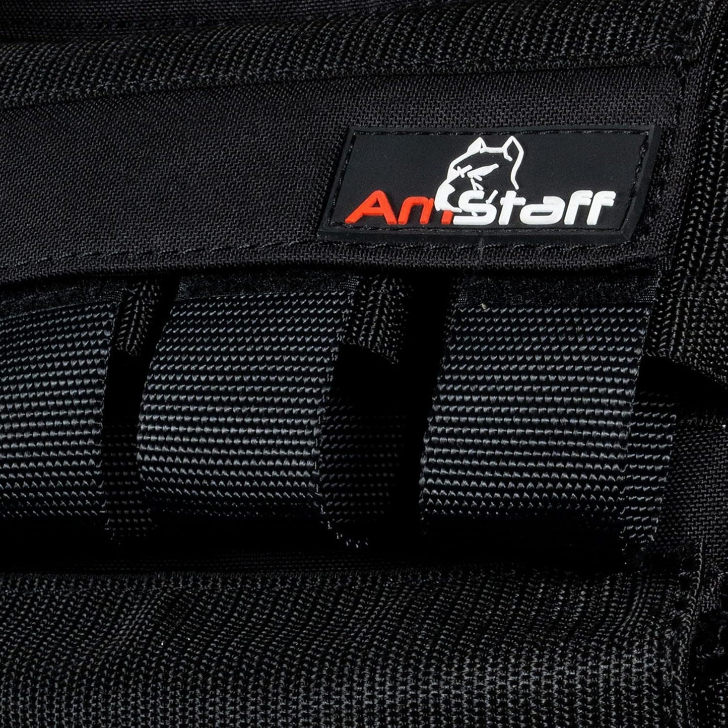 Amstaff logo on a black dog harness