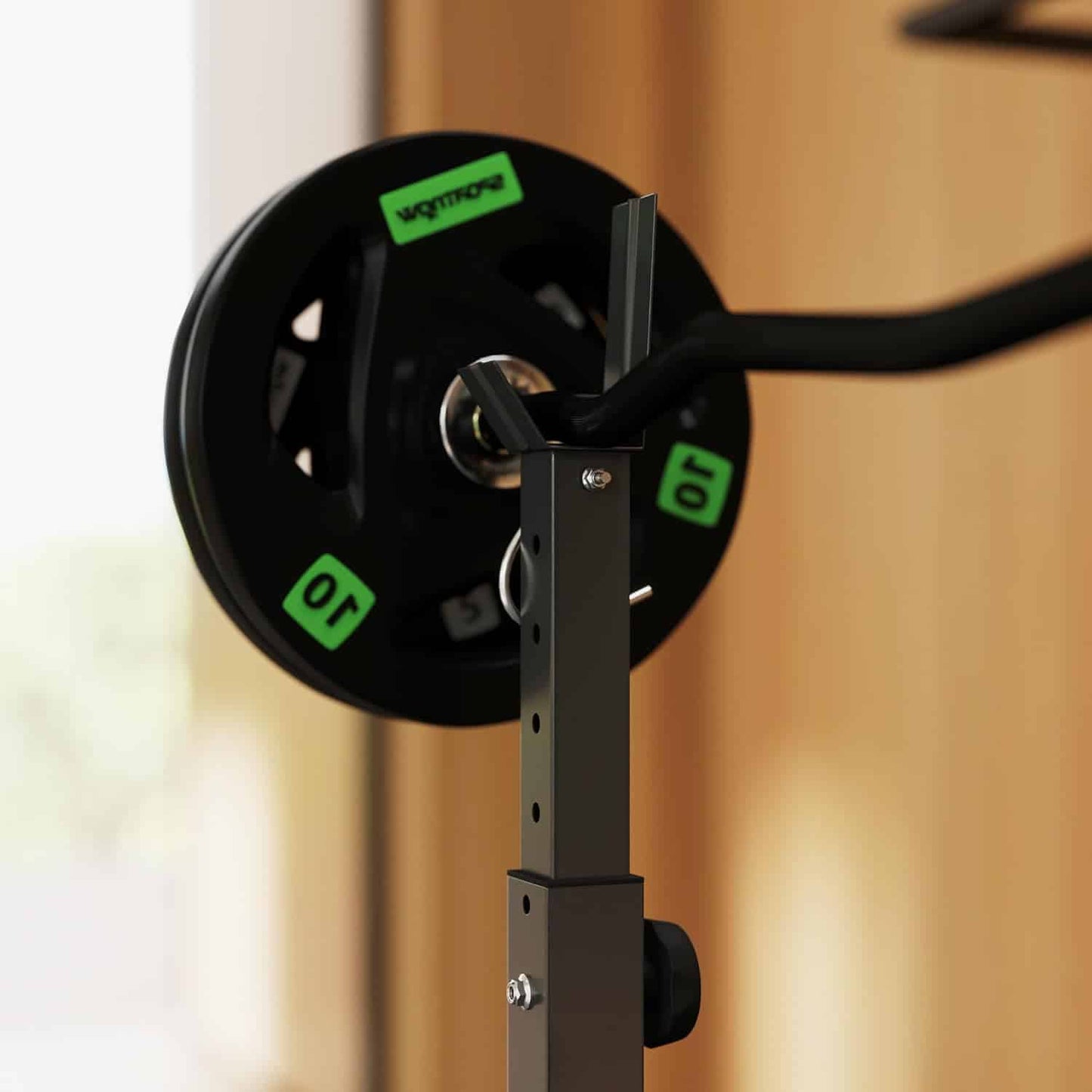 Close-up of a weightlifting barbell with weight plates on a blurred background