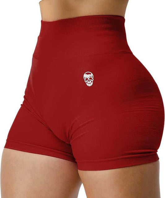 Red athletic shorts with a small white logo on a white background
