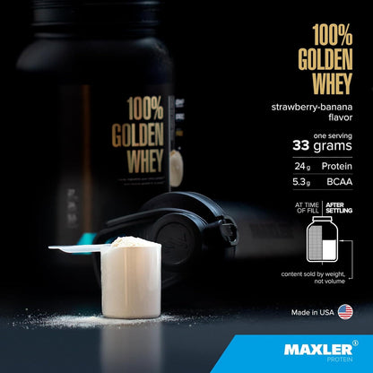 Maxler 100% Golden Whey protein powder container with a scoop of powder on a dark background
