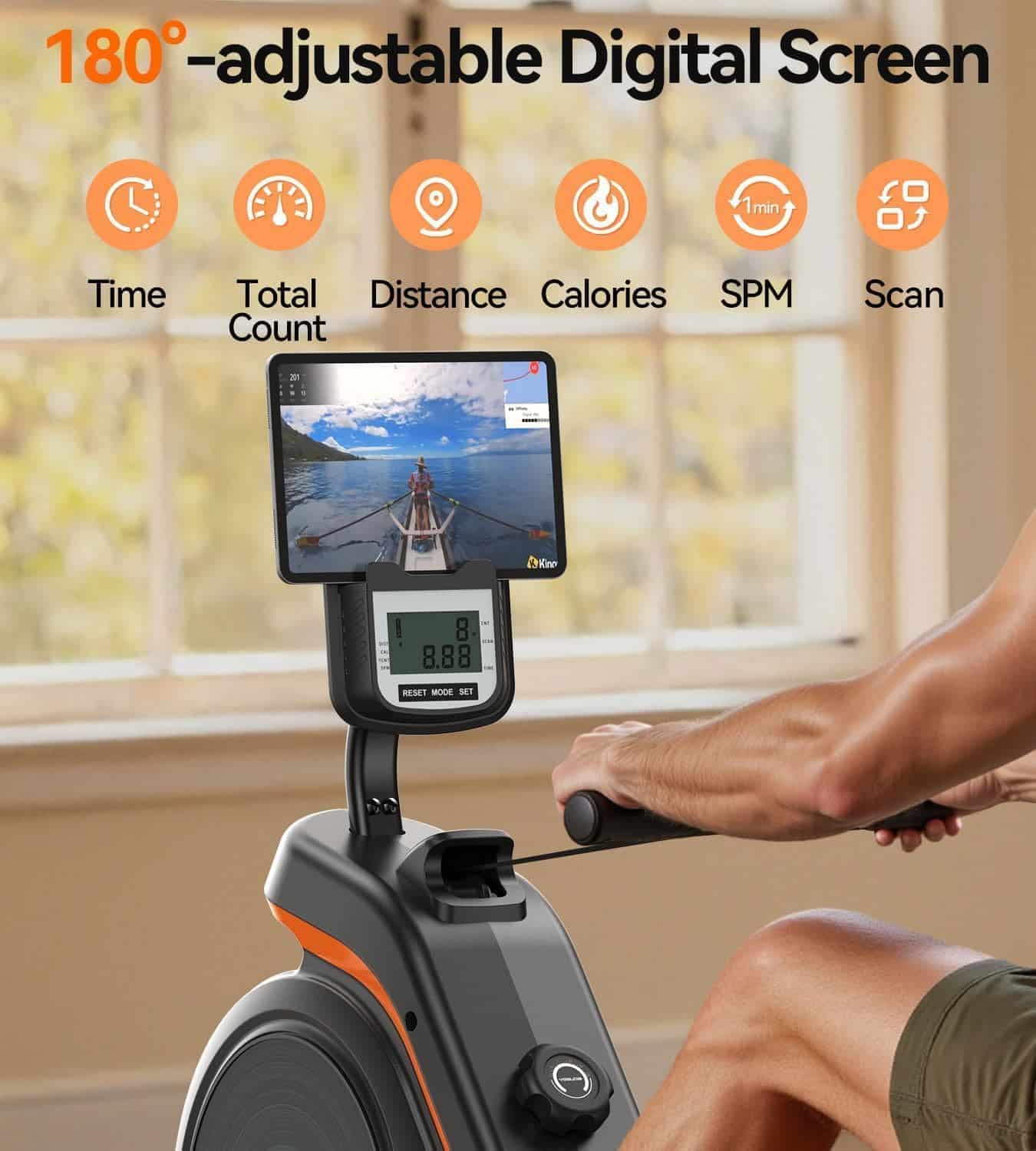 Digital screen on a rowing machine with various metrics displayed, set against a blurred indoor background.