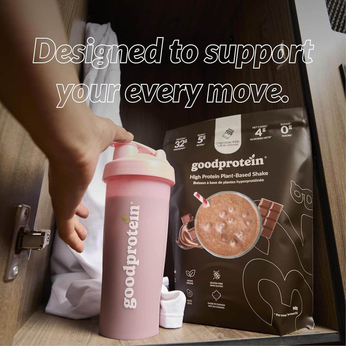 Goodprotein shaker bottle and packaging on a wooden surface with text 'Designed to support your every move.'