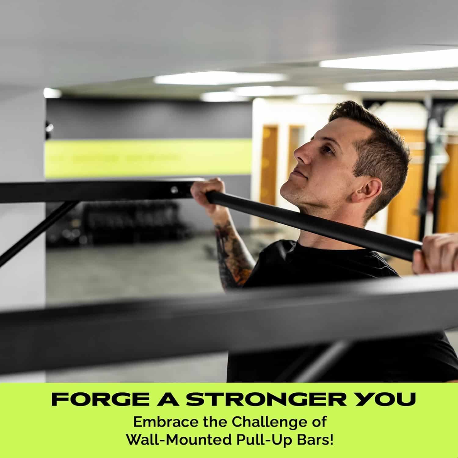 Person using a wall-mounted pull-up bar in a gym setting with motivational text.
