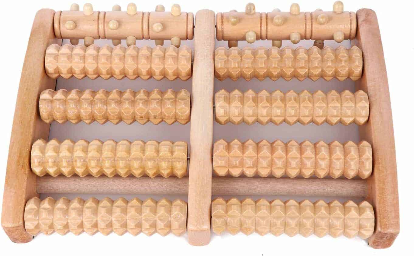 Wooden foot massager with multiple rollers on a white background