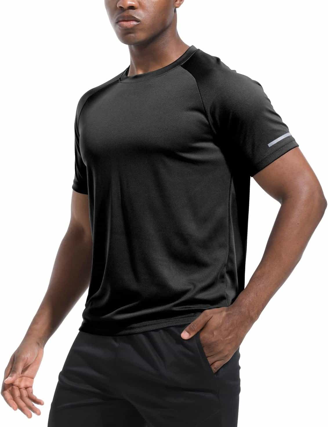 Person wearing a black athletic outfit on a white background