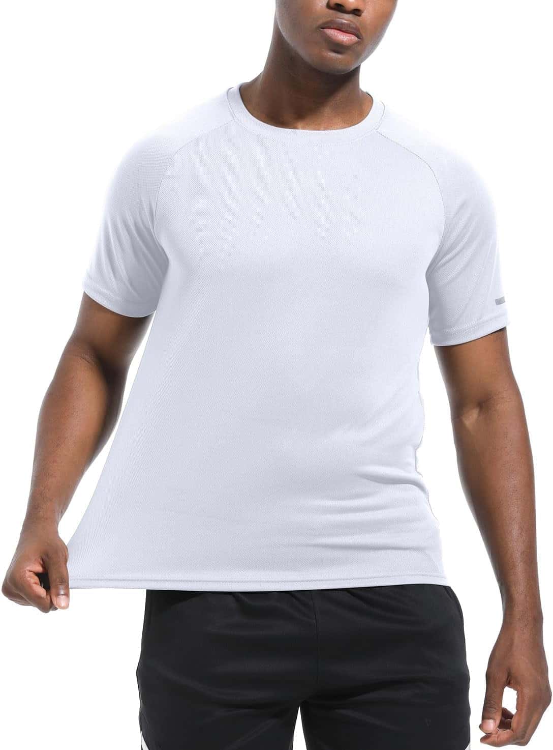 Person wearing a plain white t-shirt on a white background