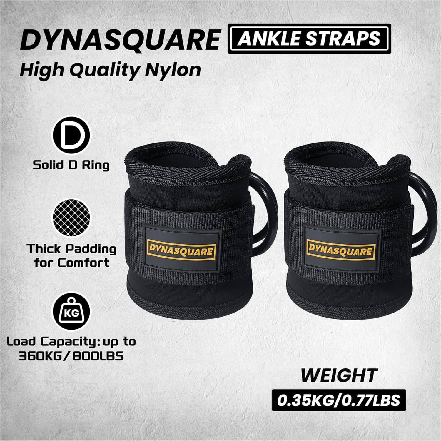 Two black ankle straps with Dynasquare branding on a gray background.