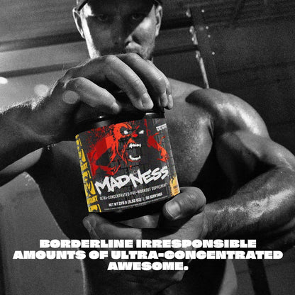 Person holding a supplement bottle labeled 'MADNESS' with text about its effects.