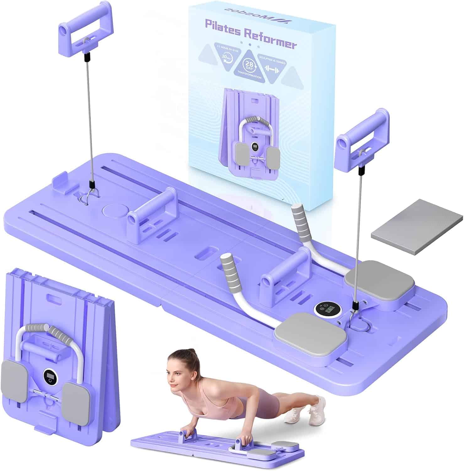 Purple Pilates reformer with accessories and packaging on a white background