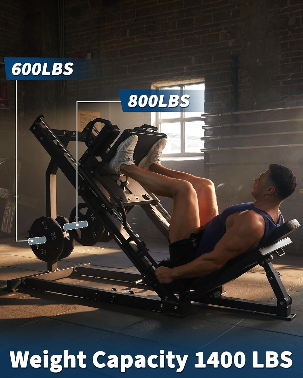 Person using a leg press machine with weight capacity information displayed.